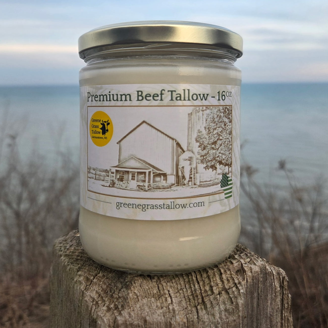 Greene Grass Tallow Premium Beef Tallow in a glass jar with a gold lid.