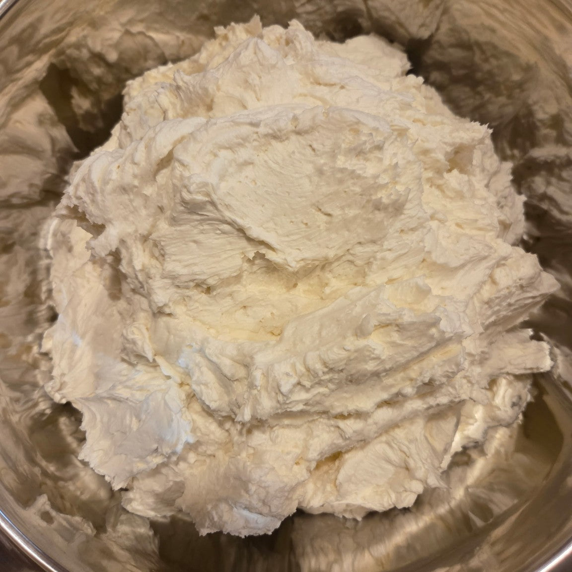 Greene Grass Tallow moisturizer being blended and whipped to a smooth texture.